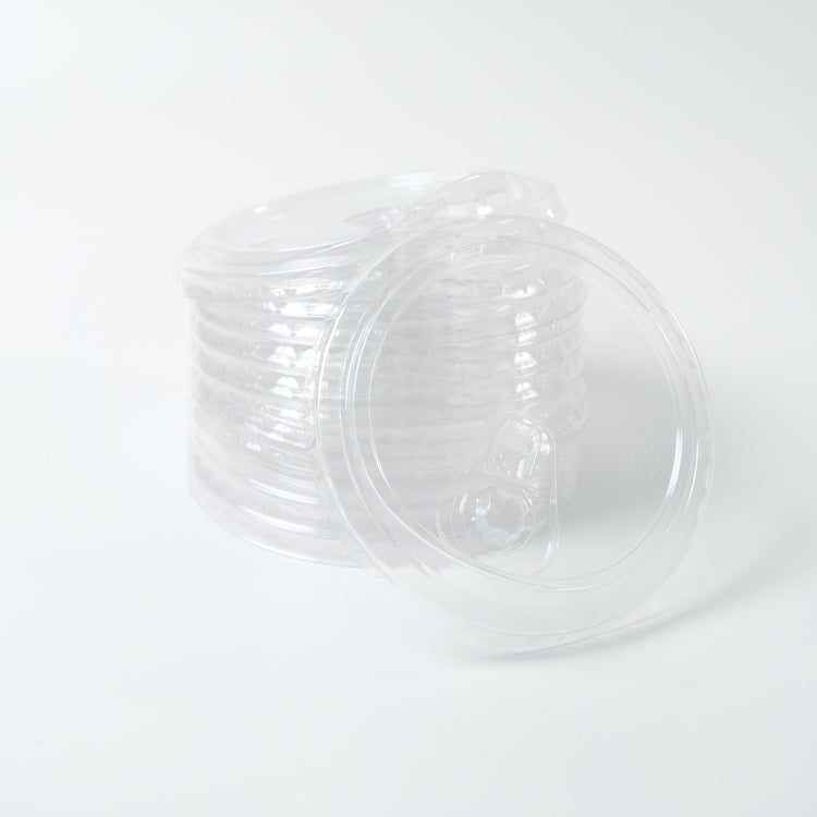 Stack of clear 95mm PP plastic sip lids with a drink aperture/closure, designed for securing hot beverages and cold drinks. Bulk case of 1000 pieces.