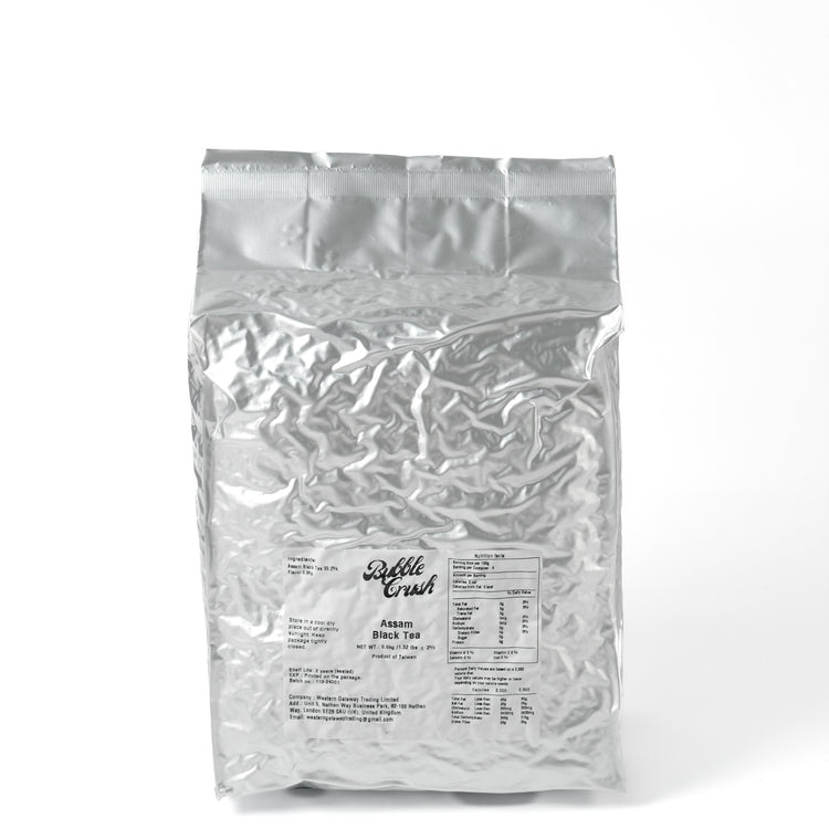 Deep, rich amber-coloured Assam Black Tea infusion, highlighting the full oxidation and strength of the loose leaf tea.