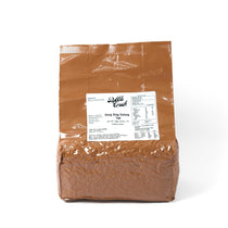 Premium Taiwanese Qingxin Oolong loose leaf tea in a 500g wholesale bag, showing the twisted, dark green tea leaves.