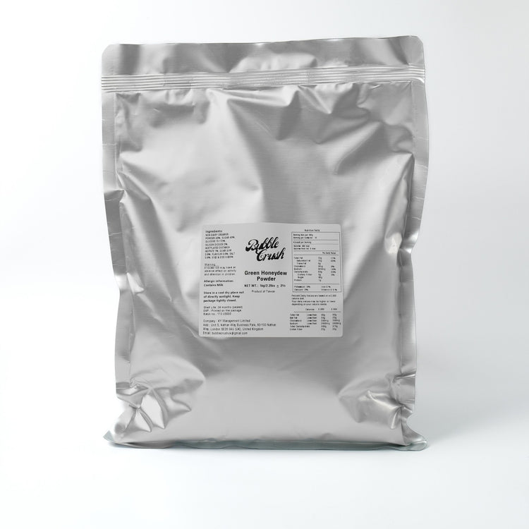 Finished Honeydew Boba Tea with a light green color and chewy tapioca pearls, made with vegan powder mix.