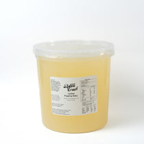 Close-up of Lychee Popping Boba, juicy and ready-to-use pearls for high-volume foodservice topping.