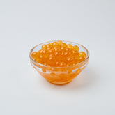 Wholesale Peach Popping Boba (3.2KG), sweet Bursting Boba topping for UK bubble tea bulk supply.