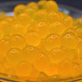 Wholesale Peach Popping Boba (3.2KG), sweet Bursting Boba topping for UK bubble tea bulk supply.