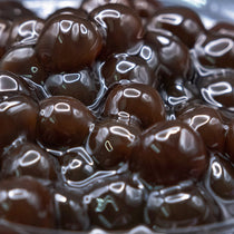Wholesale Quick-Cook Tapioca Pearls (15 Min), chewy and ready-to-serve boba for UK bulk supply.
