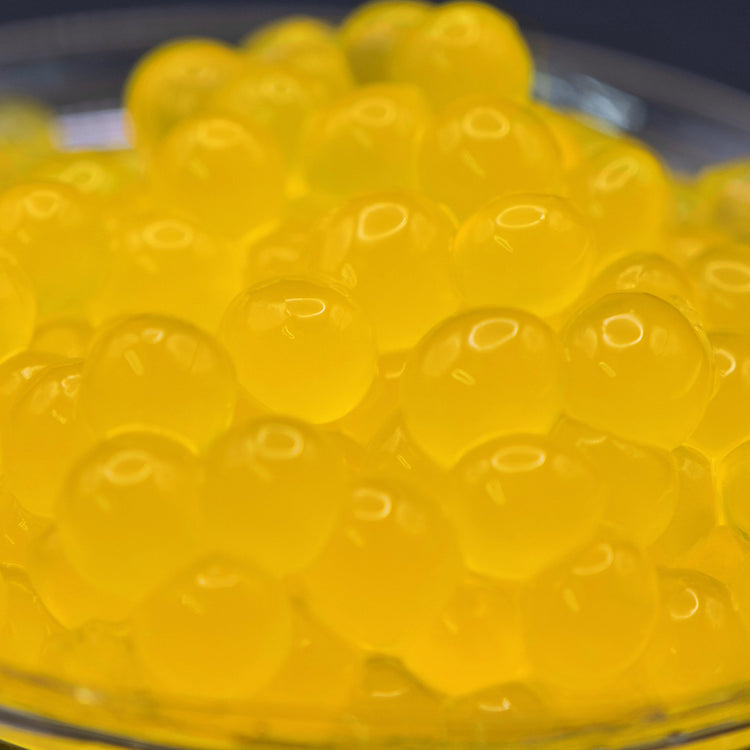Wholesale Mango Popping Boba, juicy Bursting Boba topping for UK bubble tea bulk supply and home use.