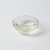 Finished Lychee Iced Green Tea or sparkling water, showcasing the refreshing and sweet Asian fruit flavour.