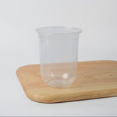 Bulk clear plastic cups (500ml/17oz) for cold drinks, ideal for bubble tea and fruit tea presentation.