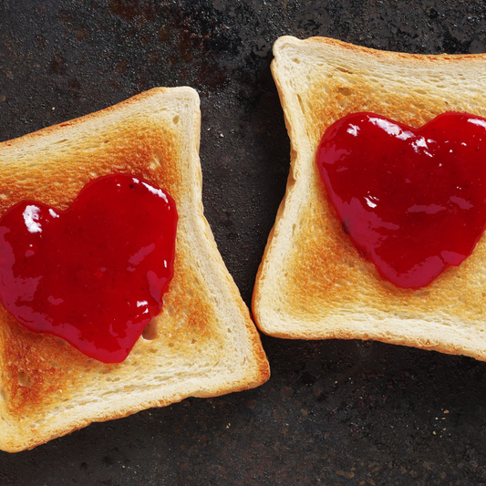 Vibrant Bubble Crush Strawberry and Passion Fruit Jams alongside refreshing fruit teas, showcasing real fruit pieces and natural flavours.