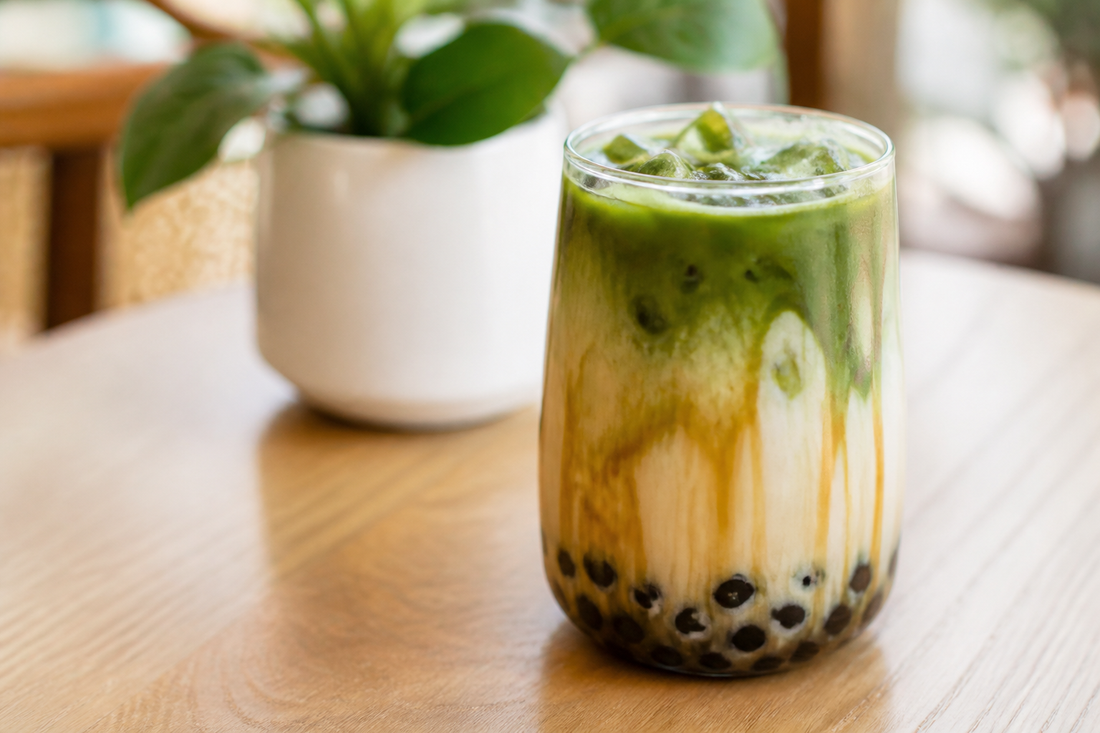 Brown sugar pure matcha latte with black tapioca pearls.
