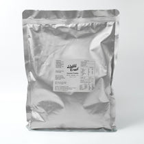 Finished Coconut Boba Tea with a creamy texture, featuring tapioca pearls and made with vegan powder.