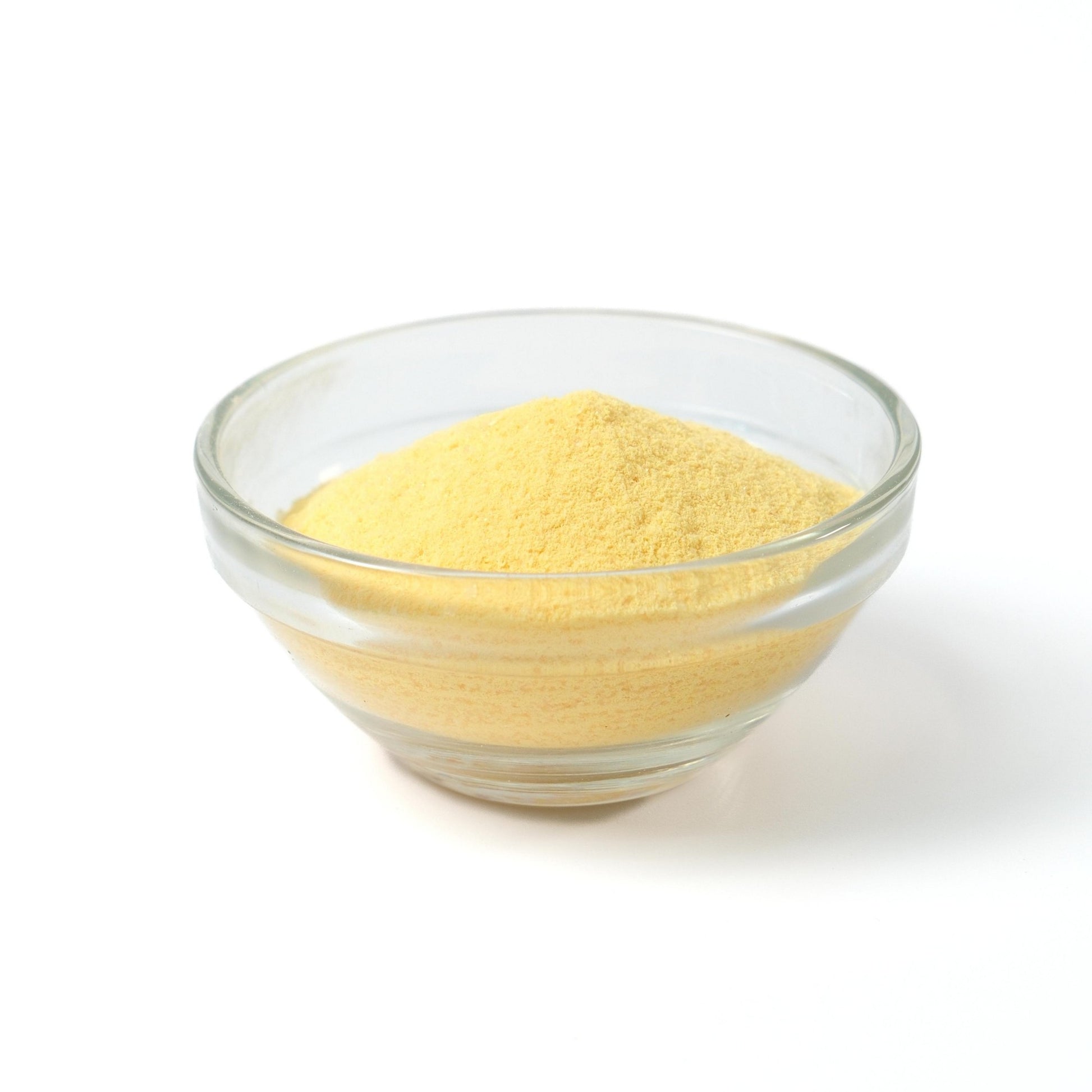 Egg pudding topping being added to a glass of bubble tea, made with the instant powder mix.