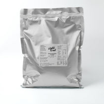 Finished Honeydew Boba Tea with a light green color and chewy tapioca pearls, made with vegan powder mix.