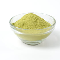 Vibrant green Matcha Latte drink showing recipe control, prepared instantly with pure powder base.