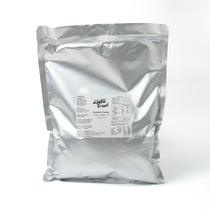 Finished Strawberry Boba Tea with a smooth texture and chewy tapioca pearls, made with vegan flavour powder.