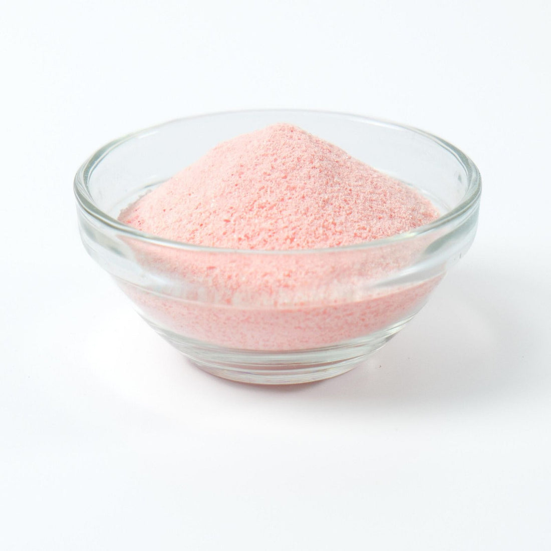 Light pink Strawberry milk tea drink being prepared instantly from the rapid-dissolve powder base.