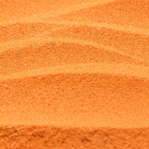 Vibrant orange Thai Milk Tea drink with a creamy smooth texture, made instantly from the powder mix.