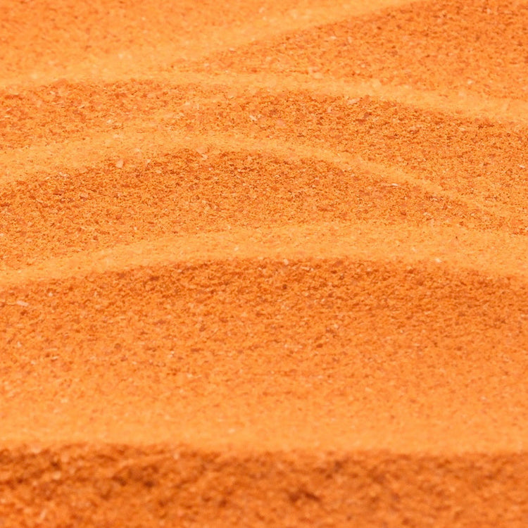 Vibrant orange Thai Milk Tea drink with a creamy smooth texture, made instantly from the powder mix.