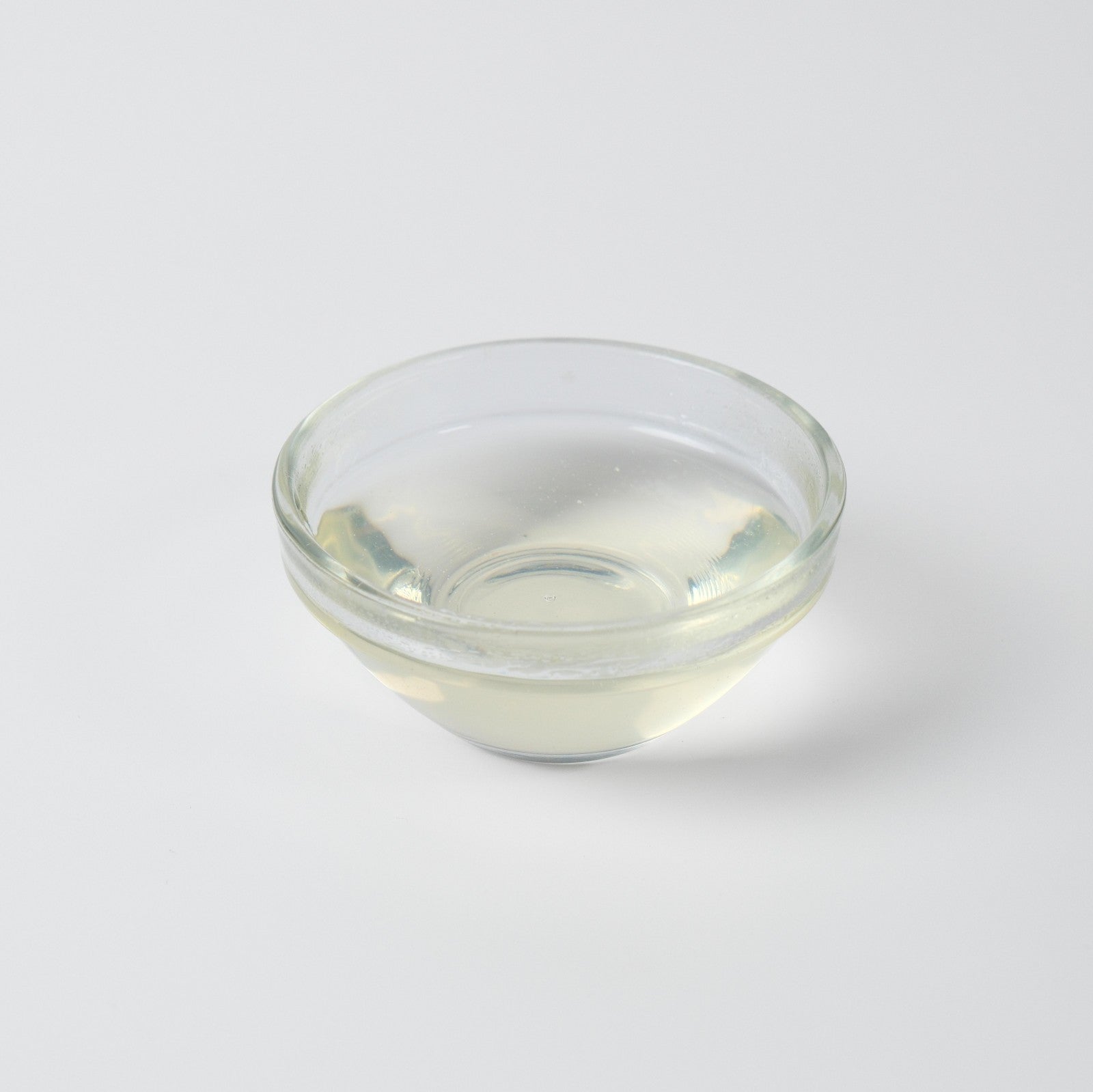 Finished Lychee Iced Green Tea or sparkling water, showcasing the refreshing and sweet Asian fruit flavour.
