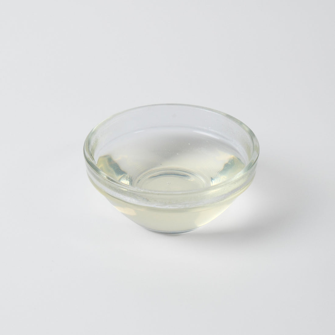 Finished Lychee Iced Green Tea or sparkling water, showcasing the refreshing and sweet Asian fruit flavour.