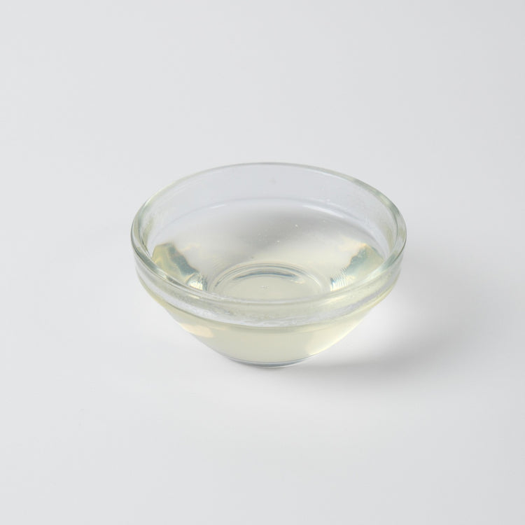 Finished Lychee Iced Green Tea or sparkling water, showcasing the refreshing and sweet Asian fruit flavour.