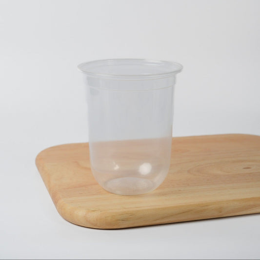 Bulk clear plastic cups (500ml/17oz) for cold drinks, ideal for bubble tea and fruit tea presentation.